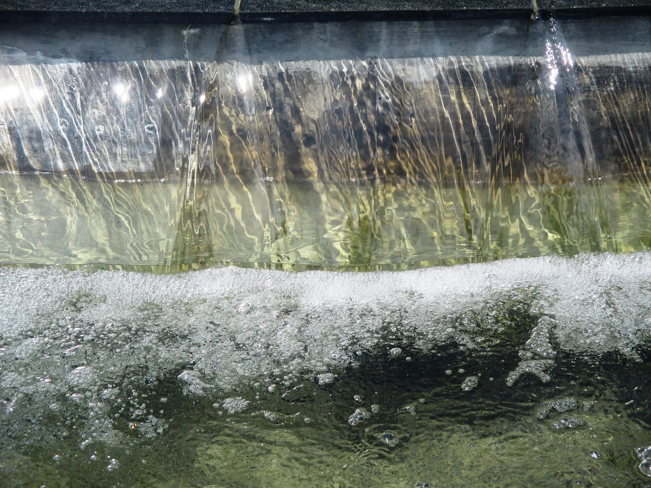 Fountain, water, pool of water — Experience Secure Transactions with the Ledger Live App